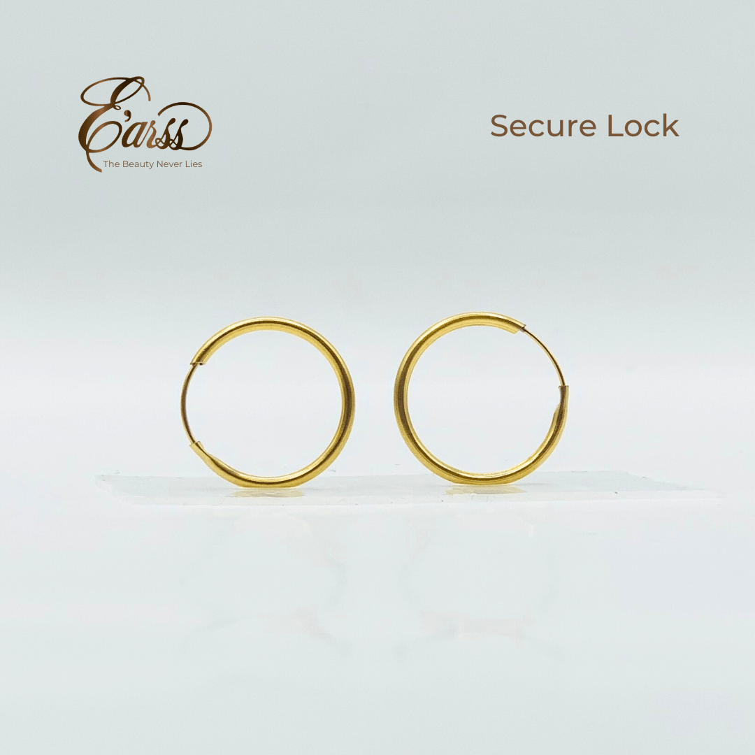 Gold hoop earrings on a light gray background with 'Earss' brand logo.
