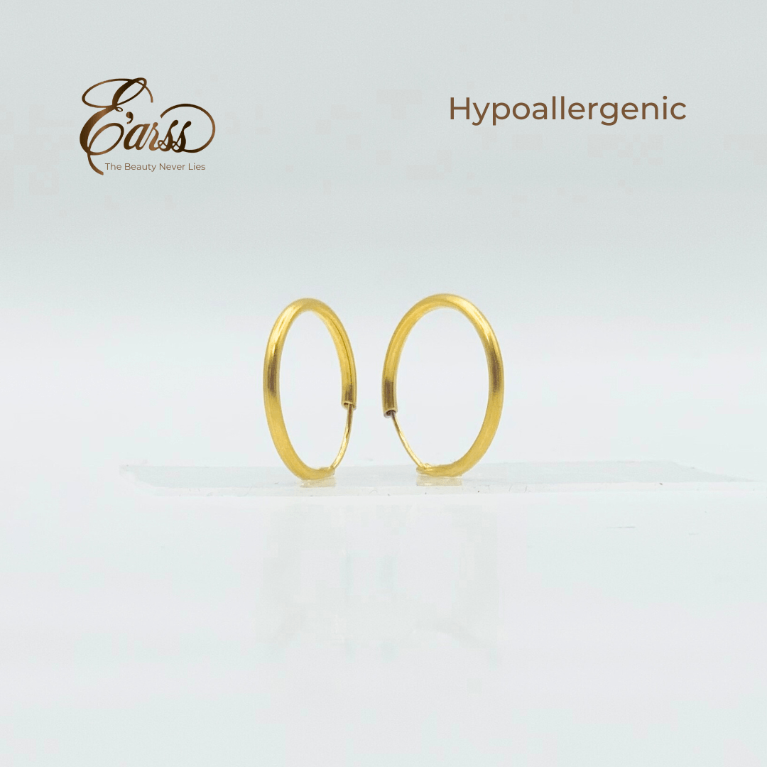 Gold hoop earrings on a light gray background with 'Earss' brand name and 'Hypoallergenic' text.