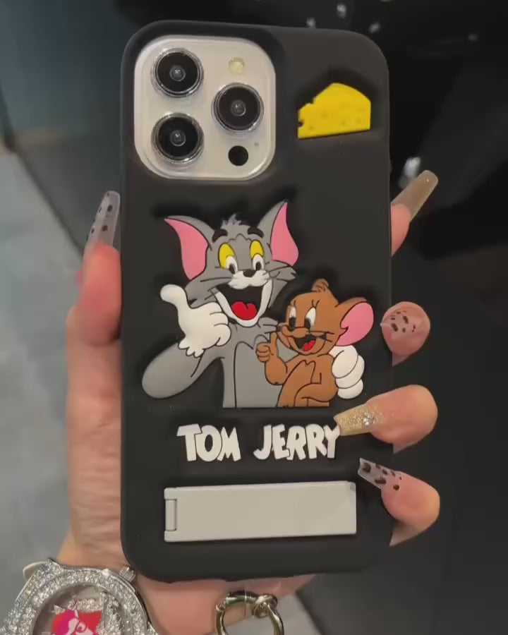 Phone case with Tom and Jerry design held by a hand