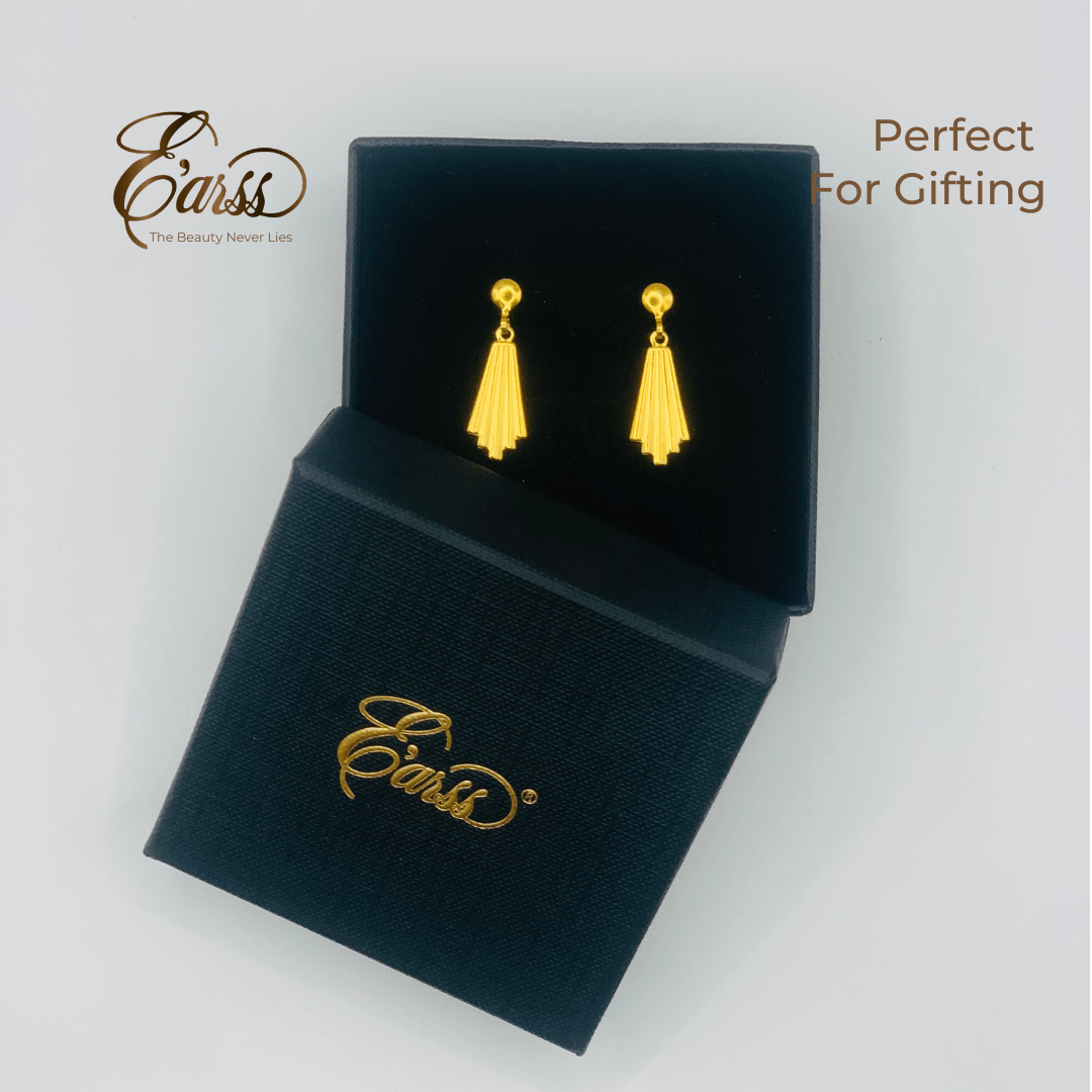 Gold earrings in a black 'Earss' branded box on a white background