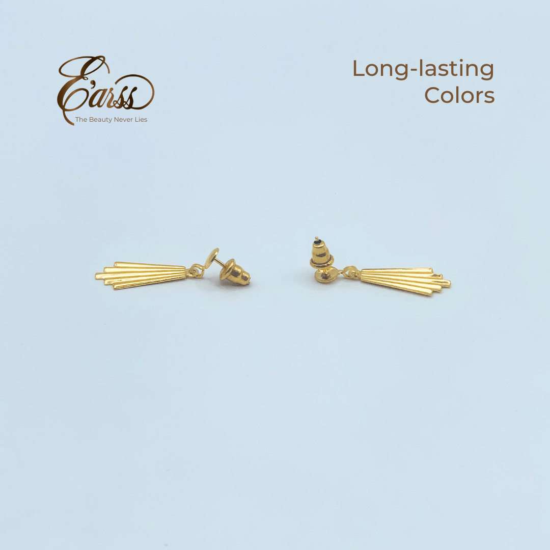 Gold earrings on a light blue background with 'Eauss' branding.