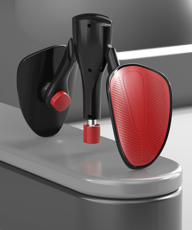 Black and red car mirror on a gray surface