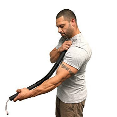 Man holding a long black hose against a white background