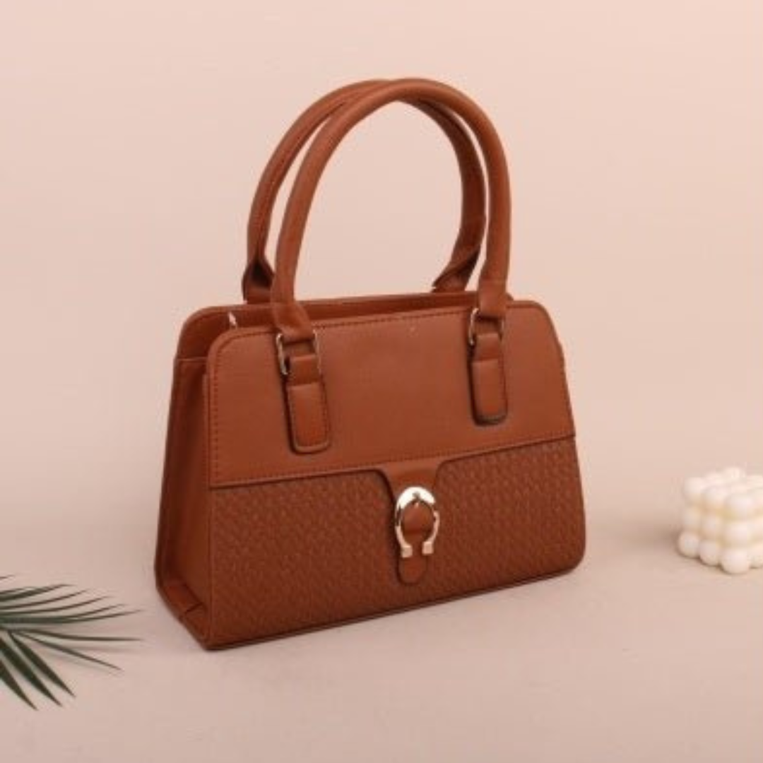 Brown handbag with a decorative clasp on a beige background