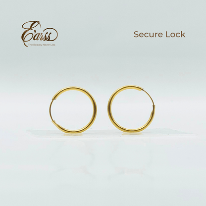 Gold hoop earrings on a light gray background with 'Earss' brand logo.