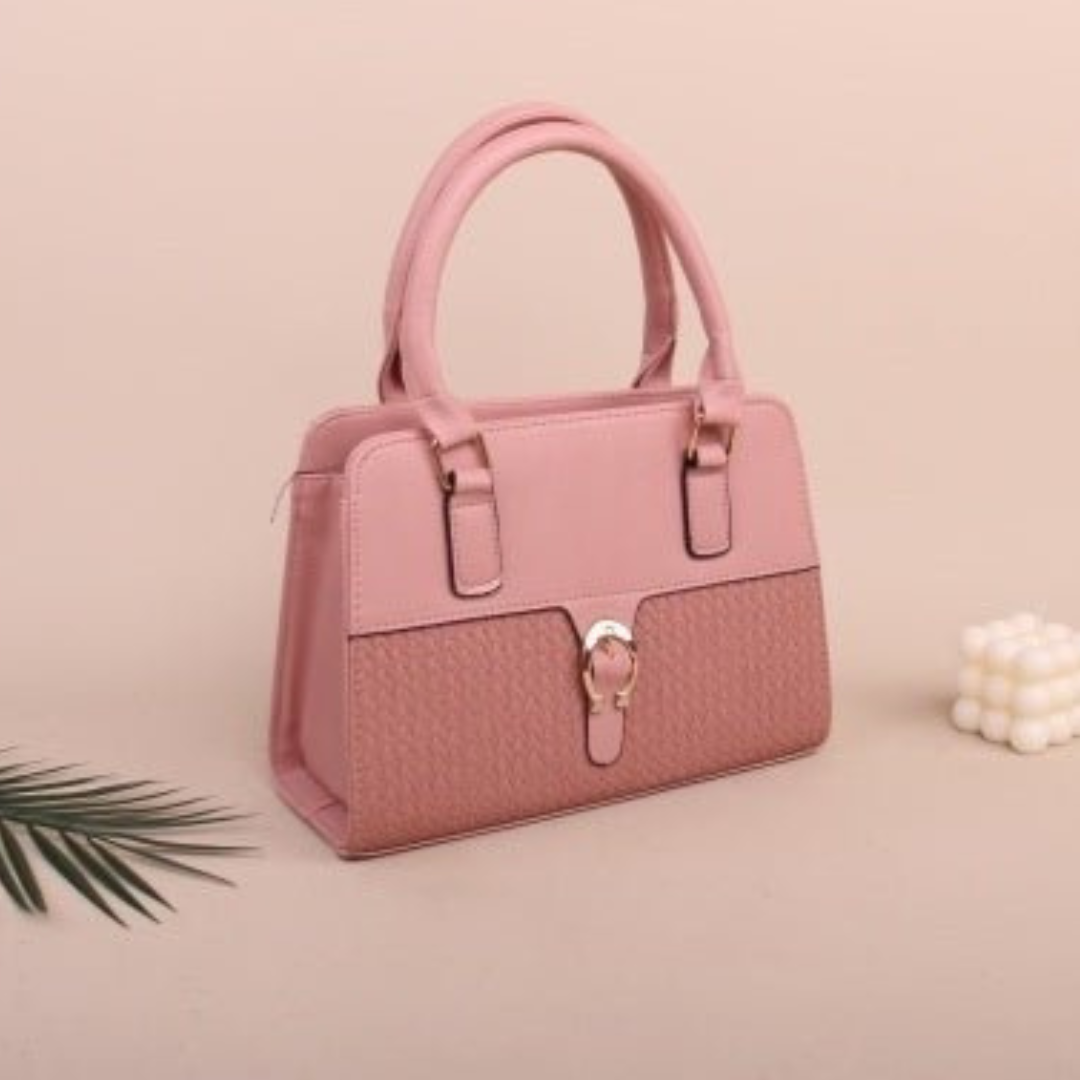Pink handbag with a textured design on a beige background