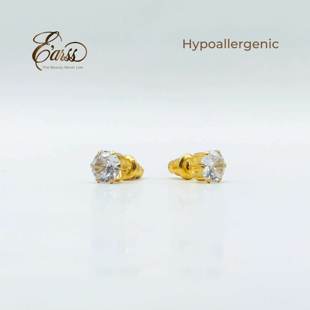 Gold earrings with clear gemstones on a light gray background, featuring the brand 'Ears'.