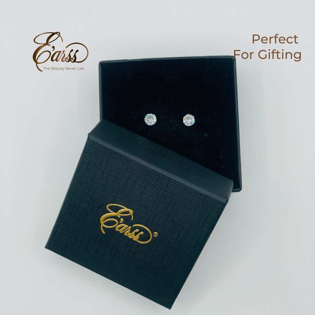 Black jewelry box with earrings inside, branded 'Ears', on a light gray background.