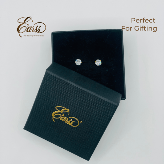 Black jewelry box with earrings inside, branded 'Ears', on a light gray background.