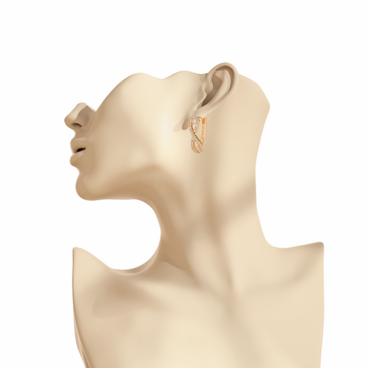 Mannequin head with a gold earring on a white background