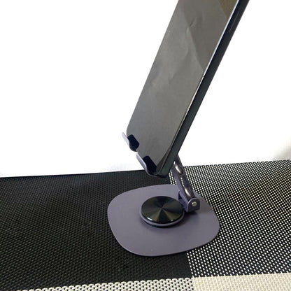 Phone stand on a textured surface with a white background