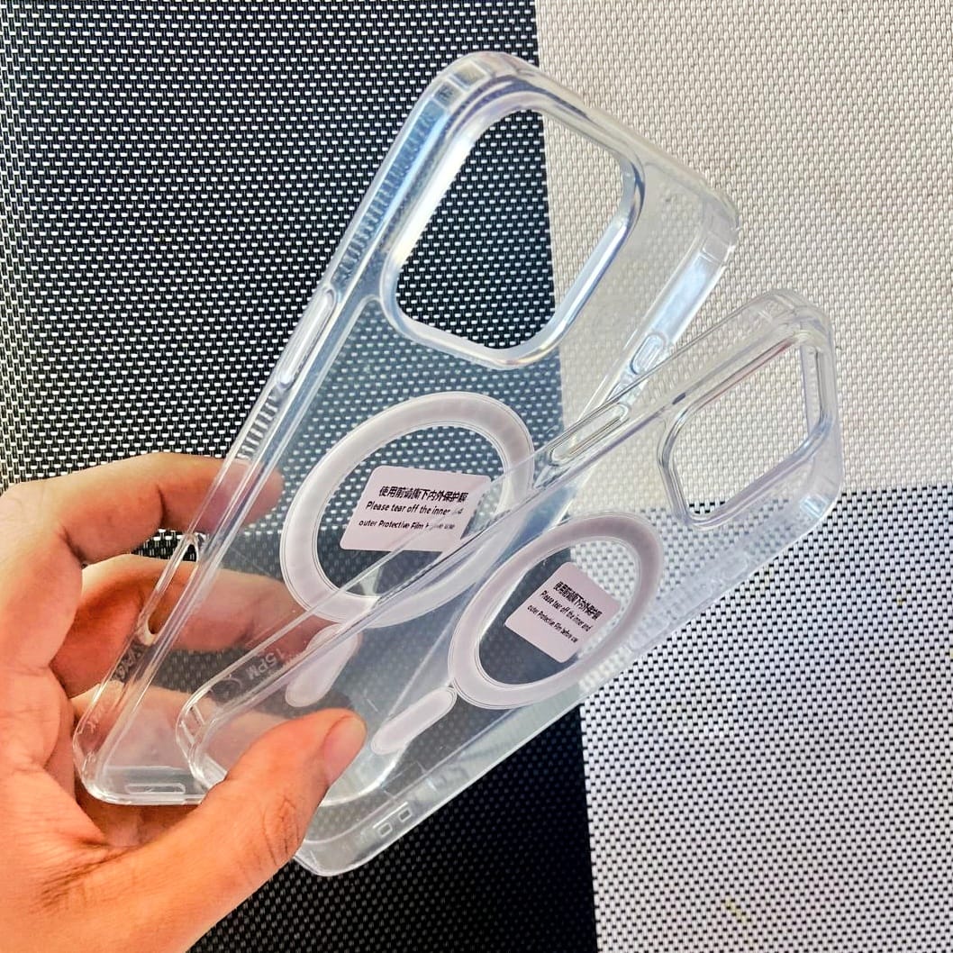 Clear phone case held by a hand with a textured background