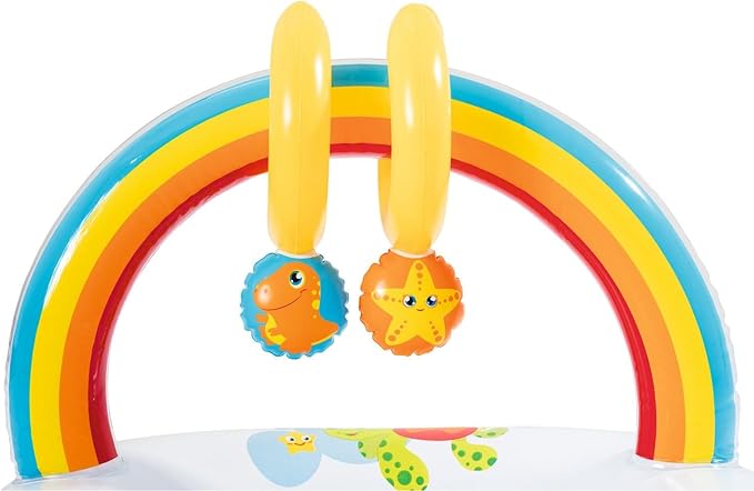Inflatable rainbow arch with toys on a white background