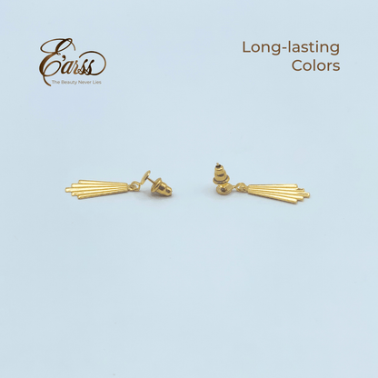 Gold earrings on a light blue background with 'Eauss' branding.