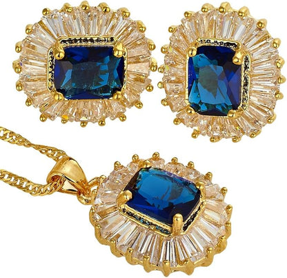 Jewelry set with blue gemstones and gold accents on a white background