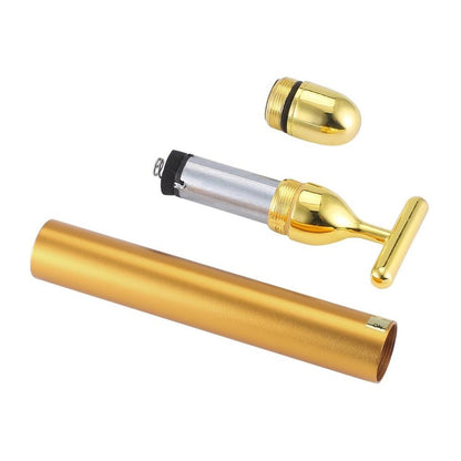 Gold-colored wine bottle stopper with a cylindrical container on a white background