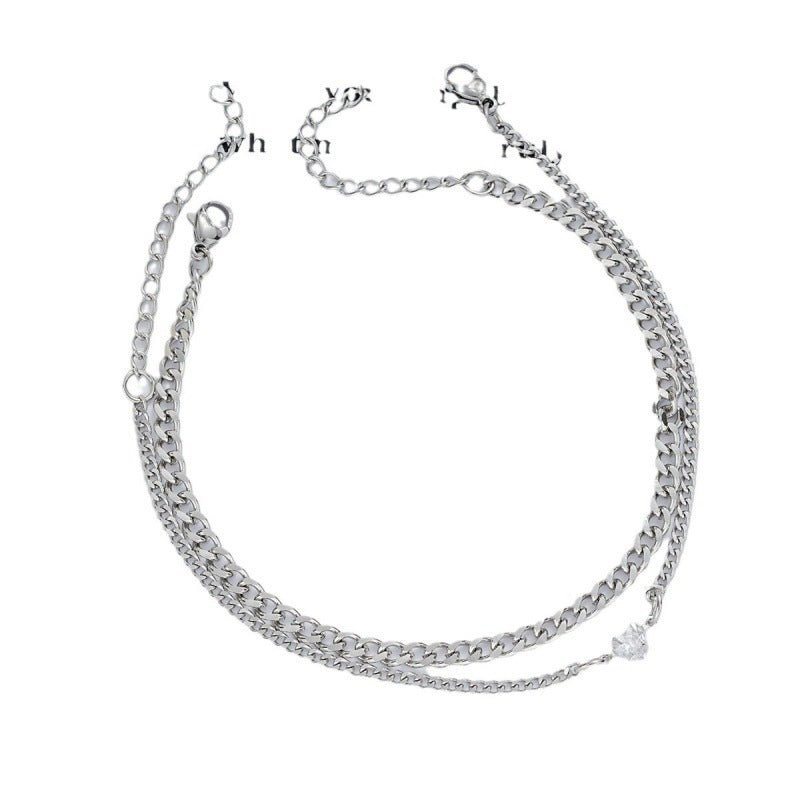 Silver chain necklace on a white background