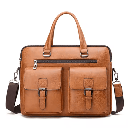 Brown leather briefcase with shoulder strap on a white background