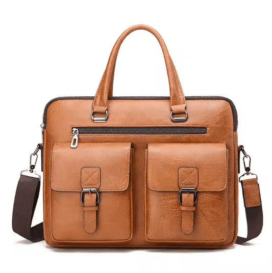 Brown leather briefcase with shoulder strap on a white background