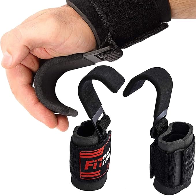 Hand holding a black wrist support with 'FitPro' branding on a white background
