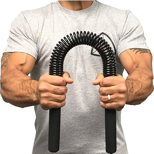 Person holding a black resistance band against a white background