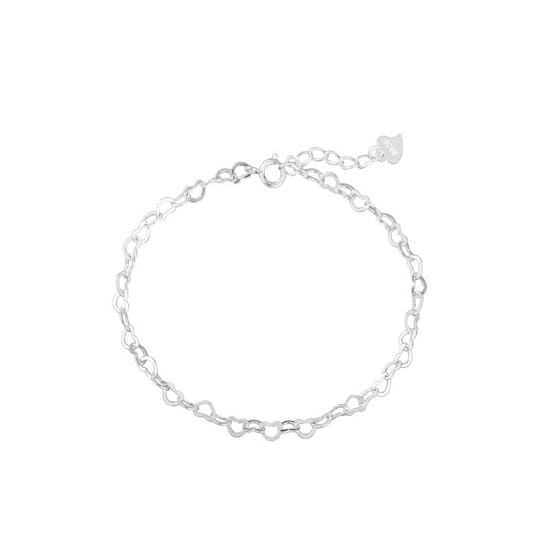 Silver chain bracelet on a white background