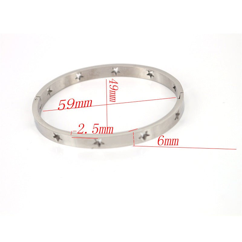 Metallic ring with measurements on a white background