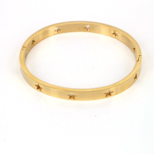 Gold bracelet with star designs on a white background