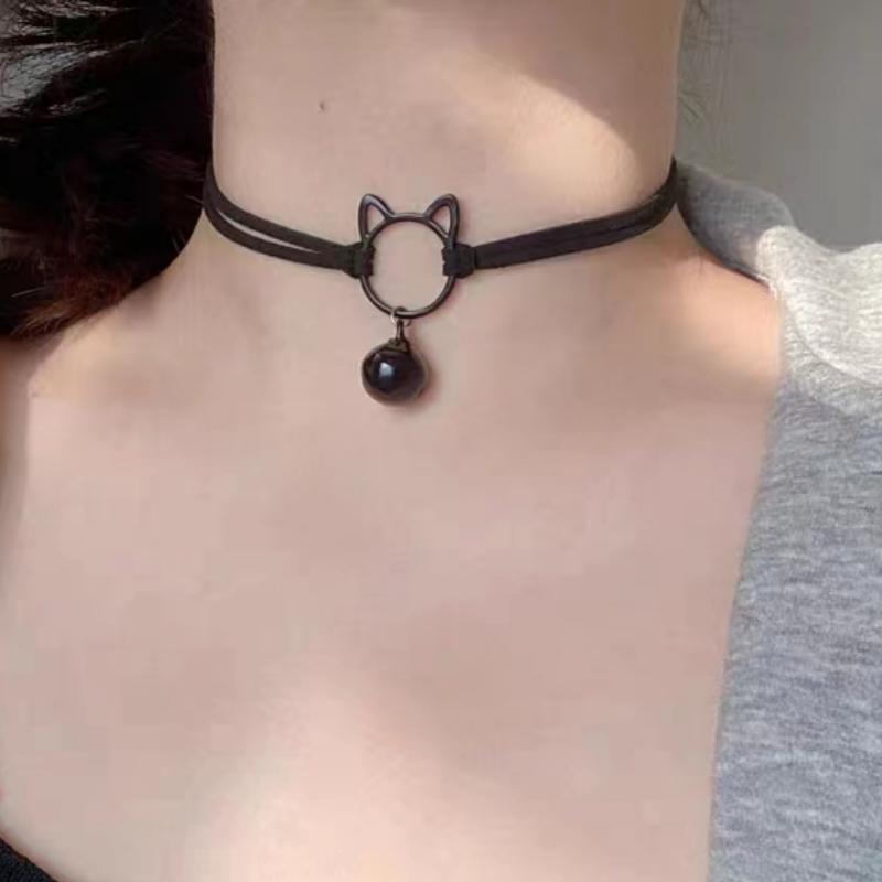 Black choker necklace with cat ear design on a person's neck