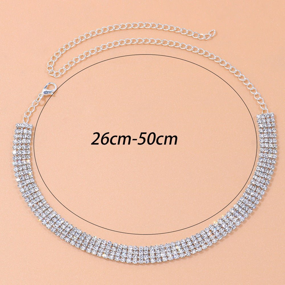 Silver necklace with adjustable chain length on a beige background